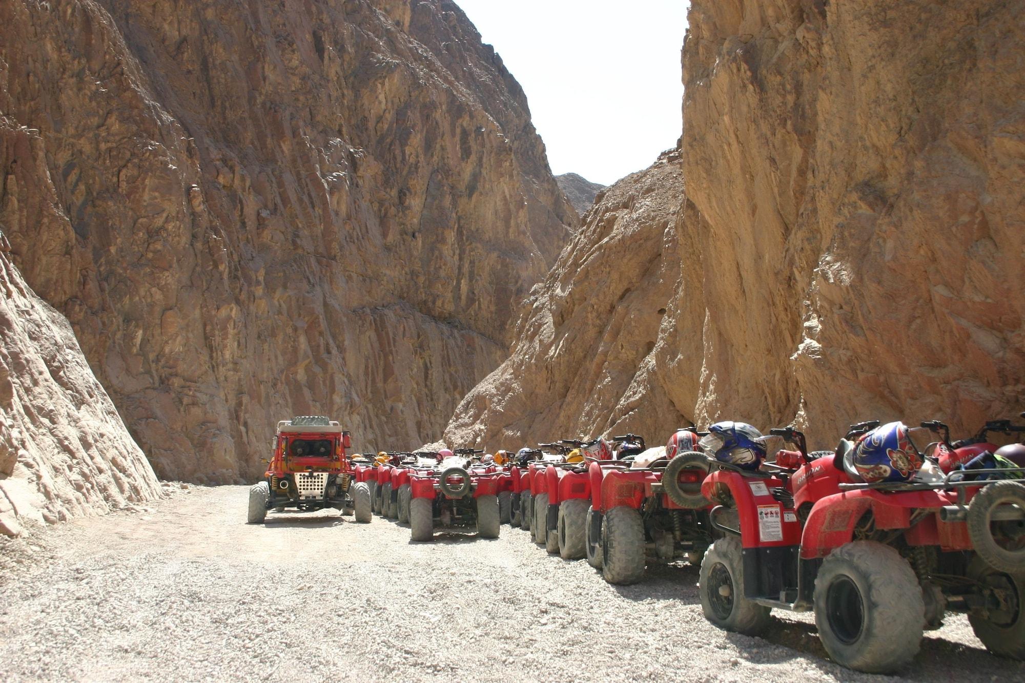 Mosaique Beach Resort Taba Heights Buitenkant foto Tourists on quad bikes in Wadi Rum